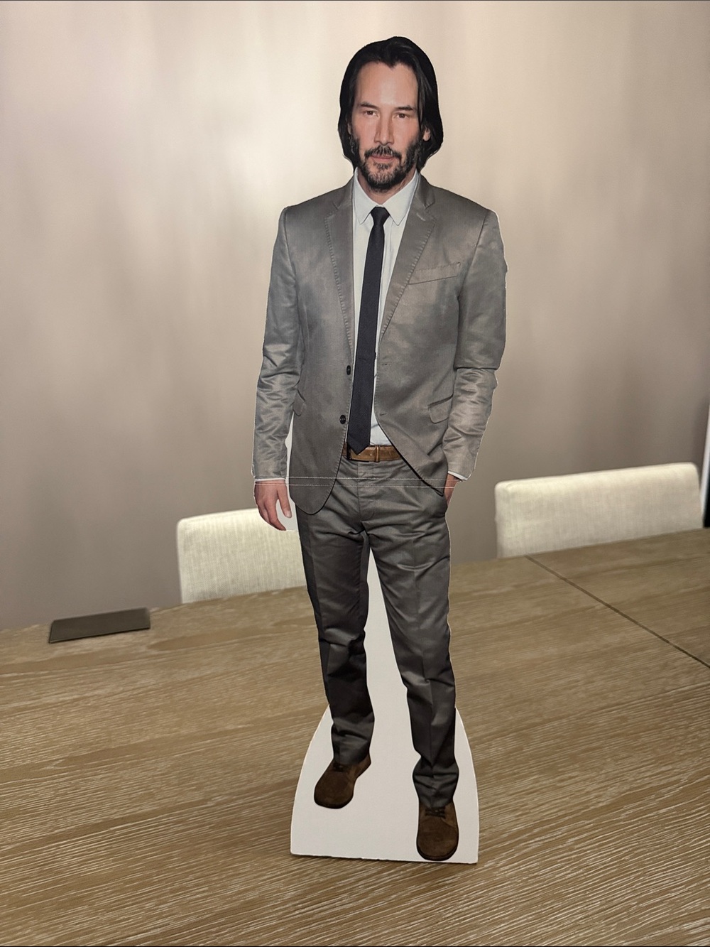 New mini Keanu reeves in a suit